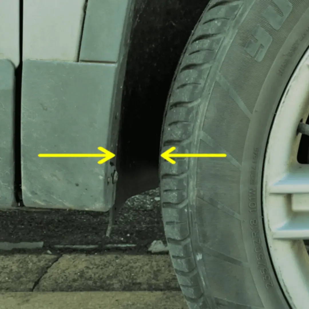 Measuring wheel arch spaces to determine if a car has suffered accident damage repair